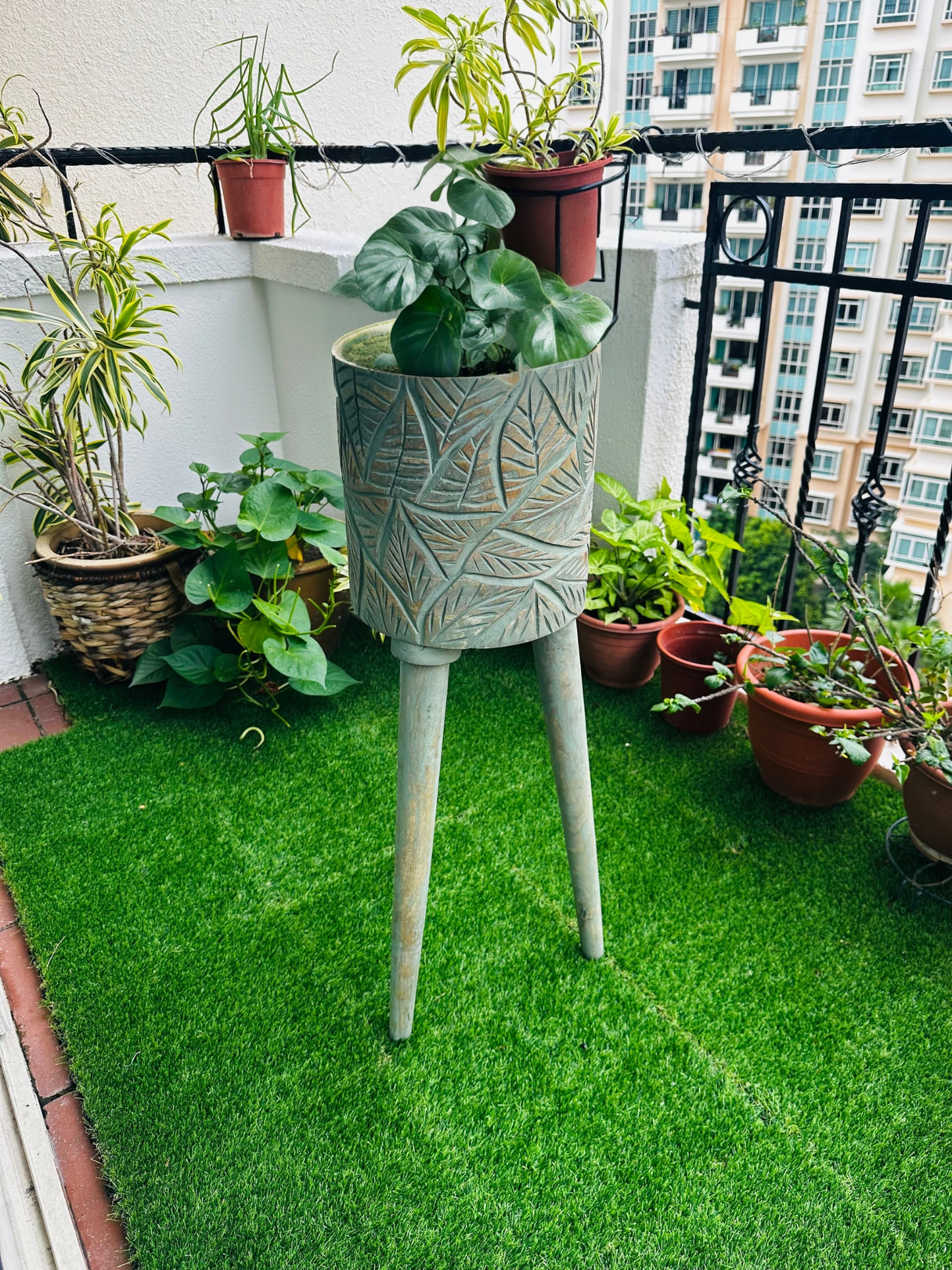 The Antique Verdigris Vessel Mango Wood Planter with detachable legs