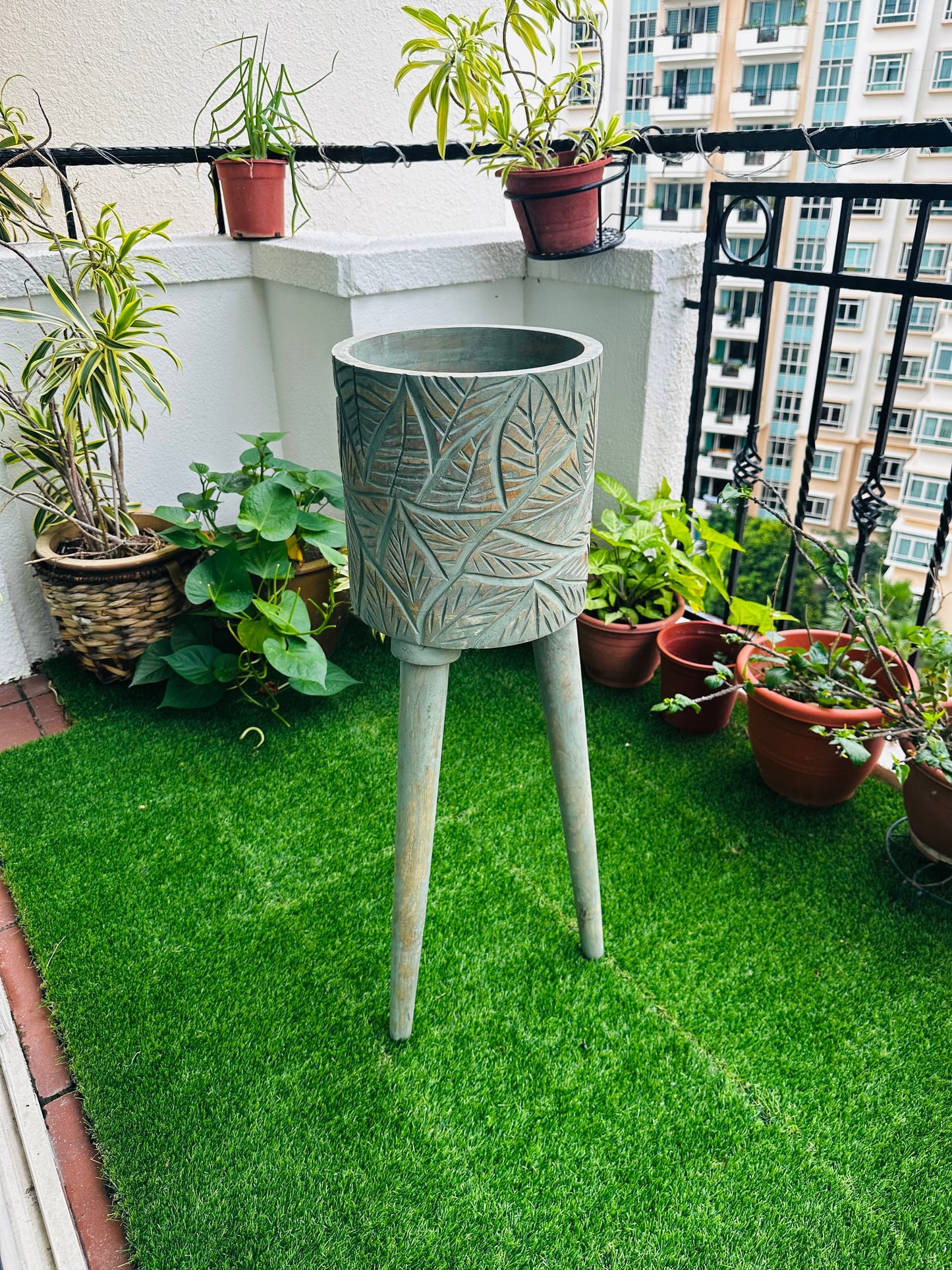 The Antique Verdigris Vessel Mango Wood Planter with detachable legs